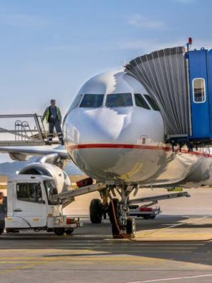 passenger-jet-airplane-docked-at-gate-768x512